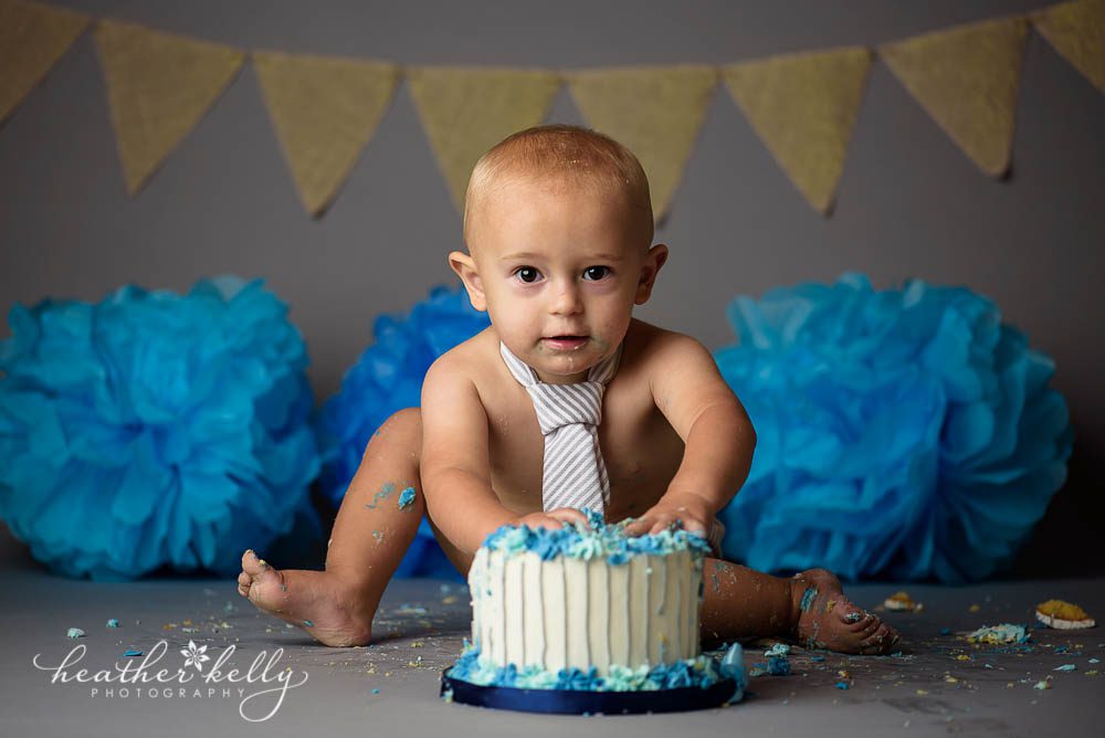 one year old cake smash with blue and gray