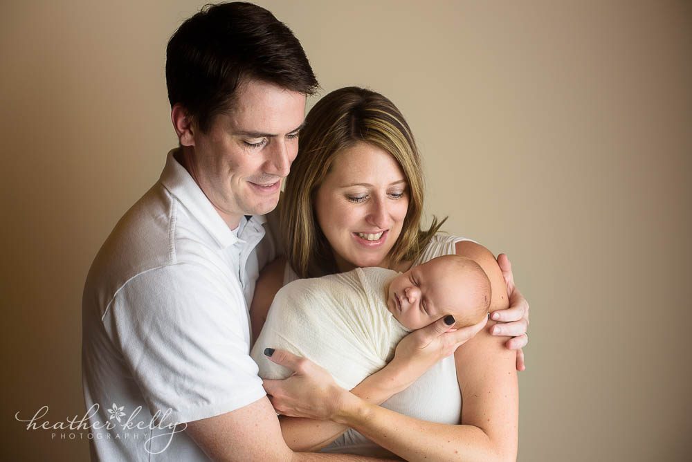 newborn photography mom and dad with newborn son