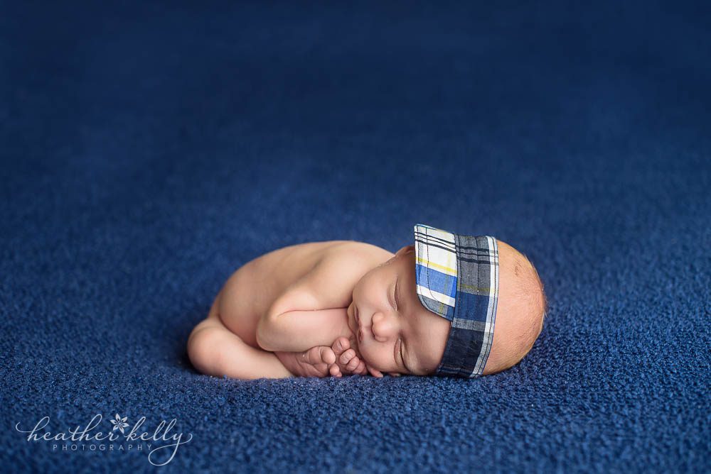 newborn photography taco pose newborn boy with visor