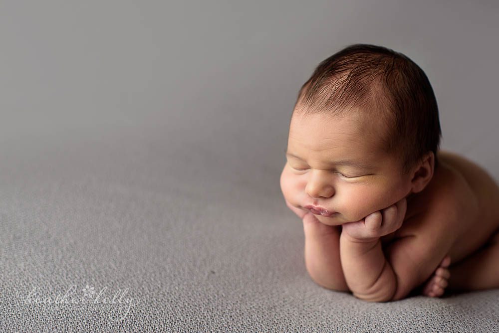 froggy side profile photo of cute baby boy fairfield newborn ct photographer
