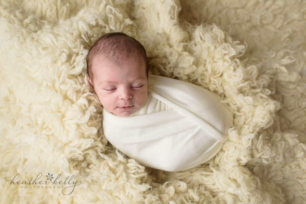 adorable wrapped up baby boy photo norwalk newborn photography ct