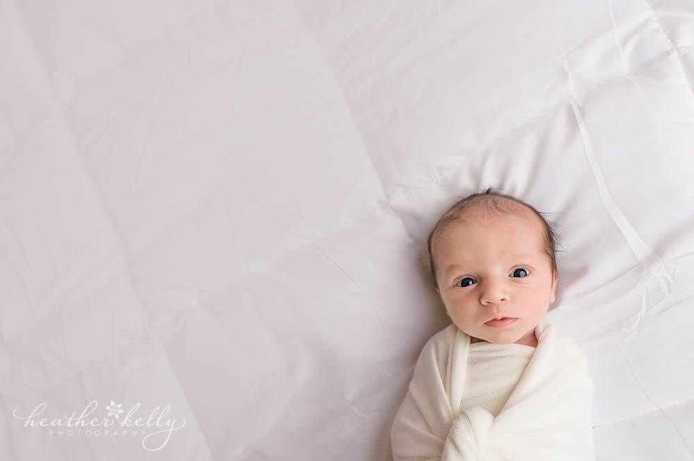 awake newborn girl photo | newborn on bed | newtown newborn photos