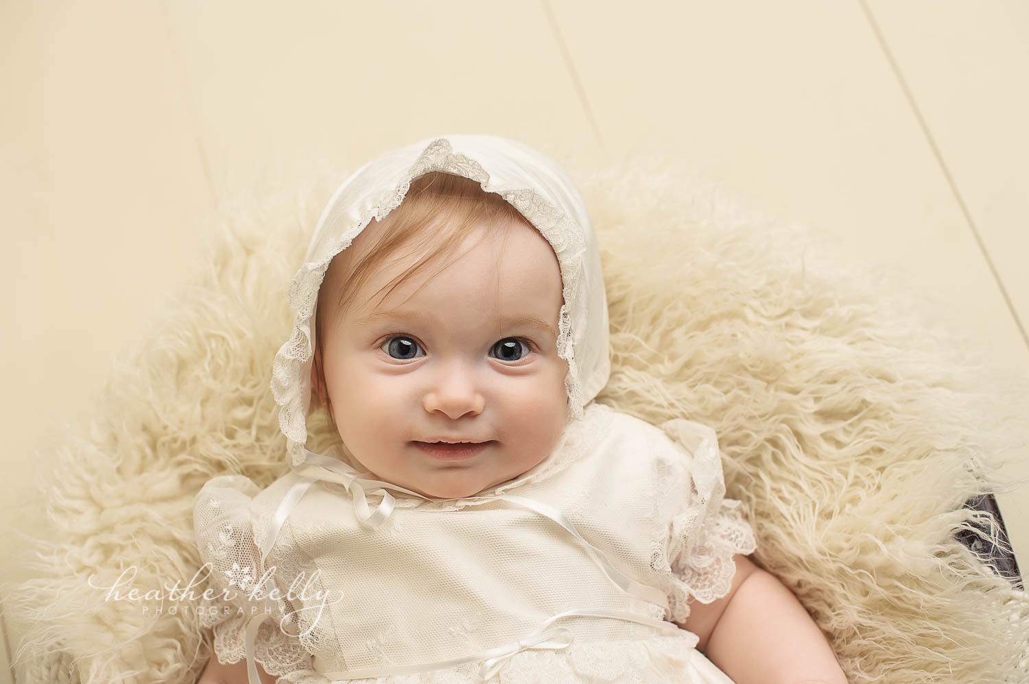 close up of baby girl in white baptism gown photo. Baptism portrait photography by ct baby photographer heather kelly photography