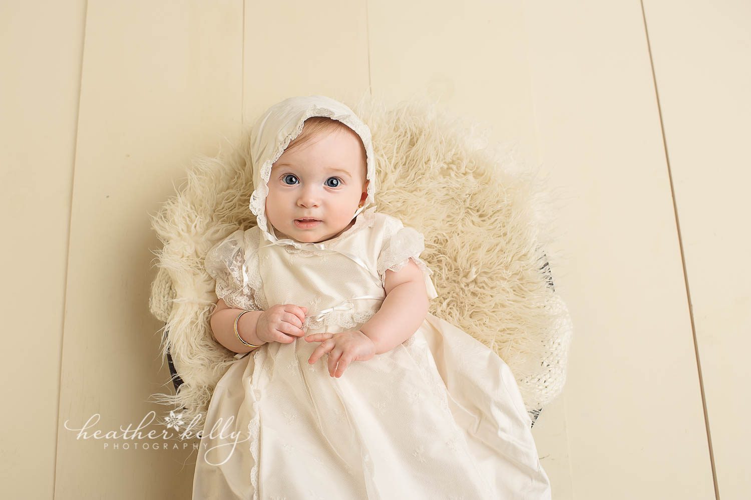 baby girl in white baptism gown photo. Baptism portrait photography by ct baby photographer heather kelly photography