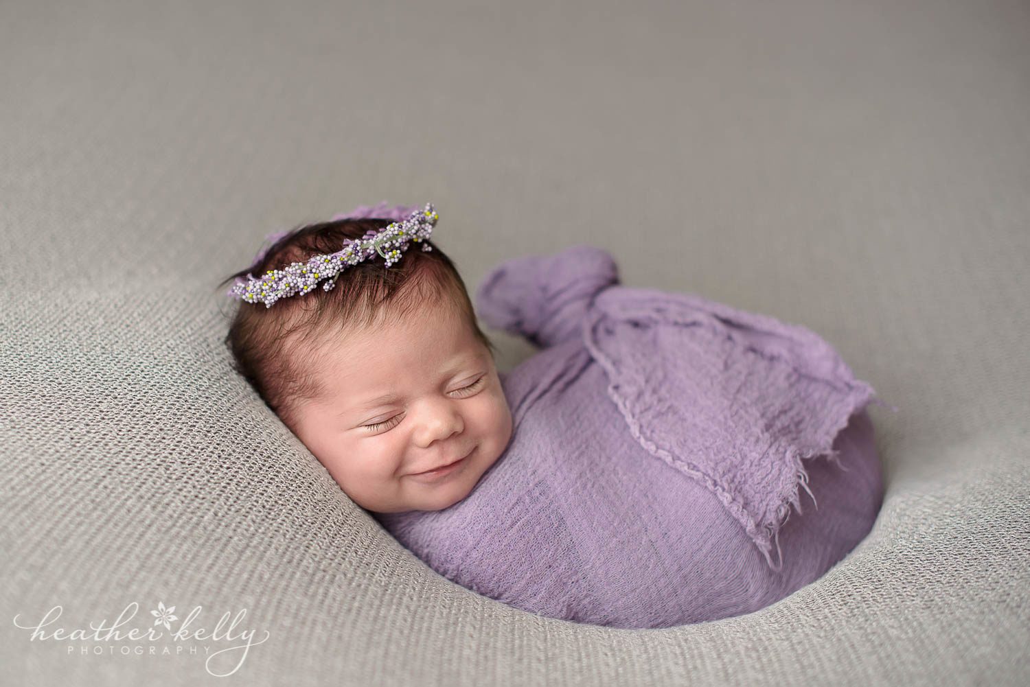 gray and lavender newborn photo of baby girl wrapped. Weston ct newborn photography