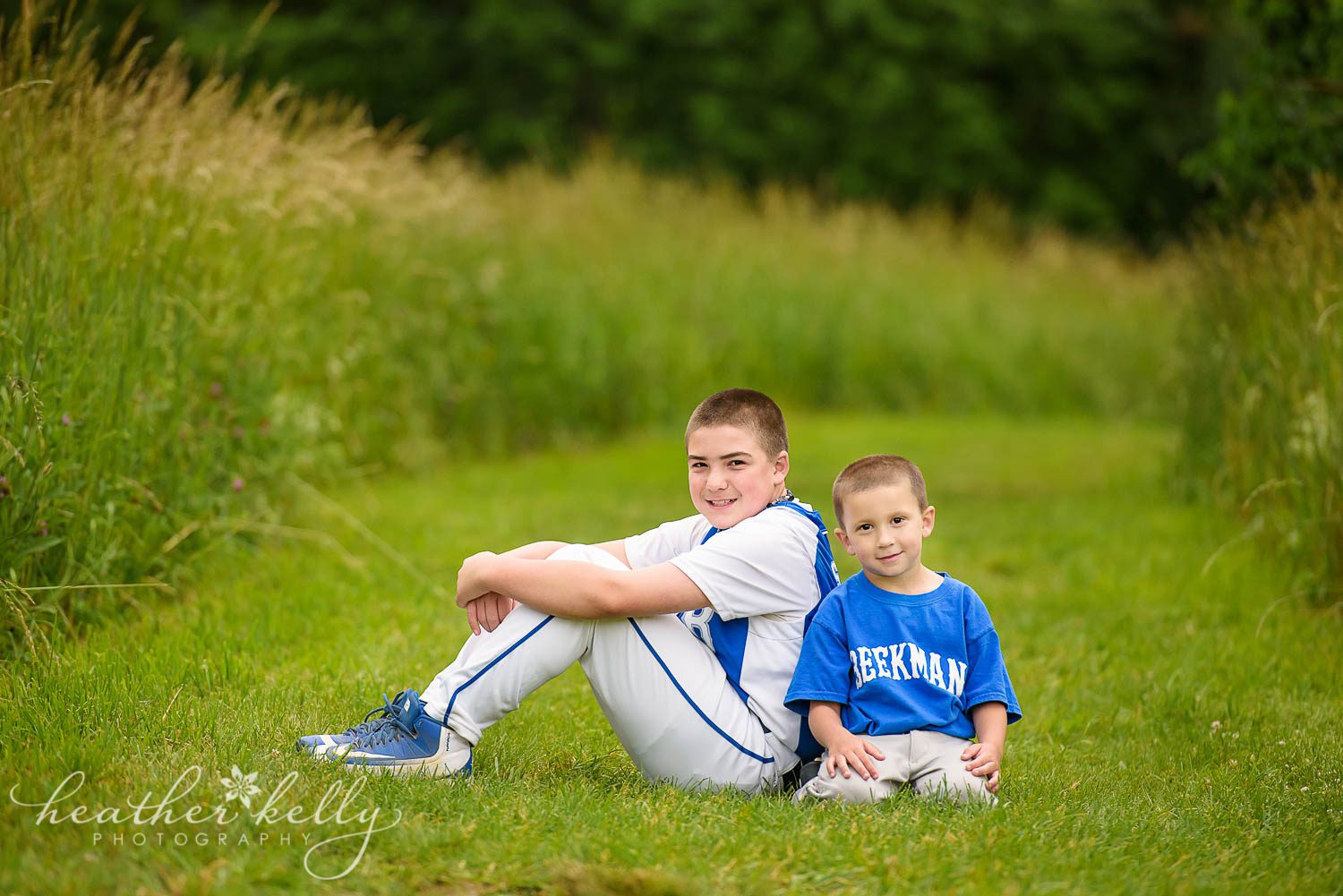 brothers in baseball uniforms during photo session. poughquag ny family photography