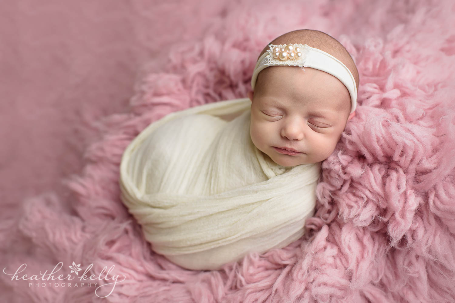 pink and ivory wrapped newborn girl. newborn wrapping poses