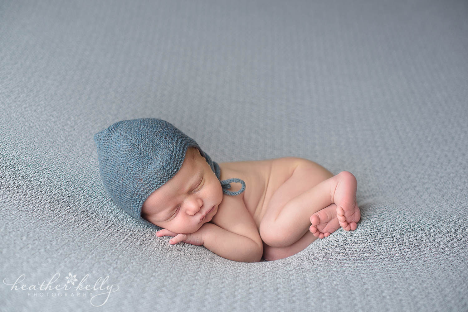 adorable baby boy newborn snuggle newborn photography poses