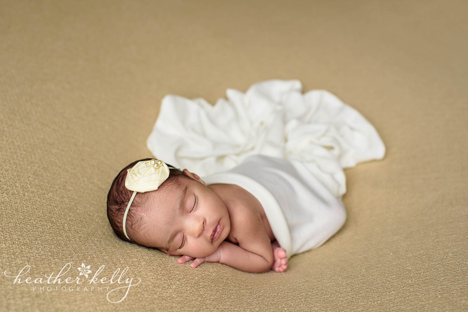 newborn girl in white wrap and headband. newborn photography east hartford ct