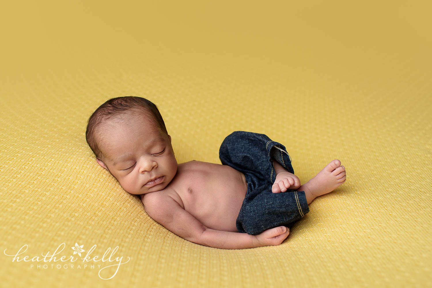 newborn boy in jean pants. east hartford newborn photography