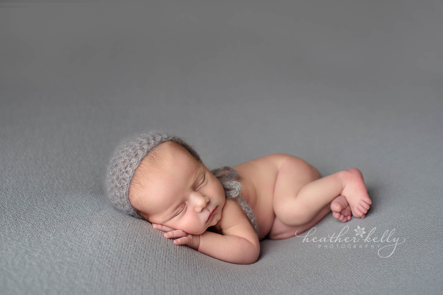 baby boy side lying gray newborn photography shelton ct