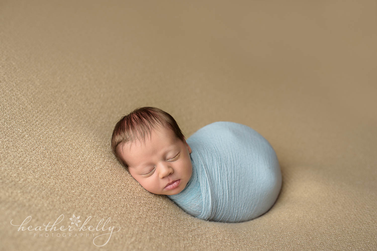 tan and blue newborn photography baby boy