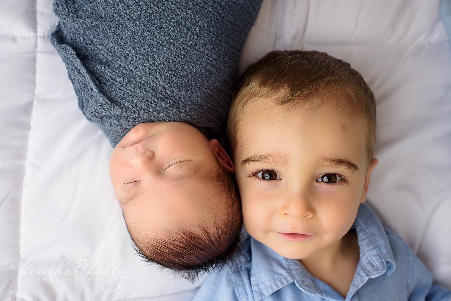 sibling newborn photography with heads next to each other. danbury ct newborn photography