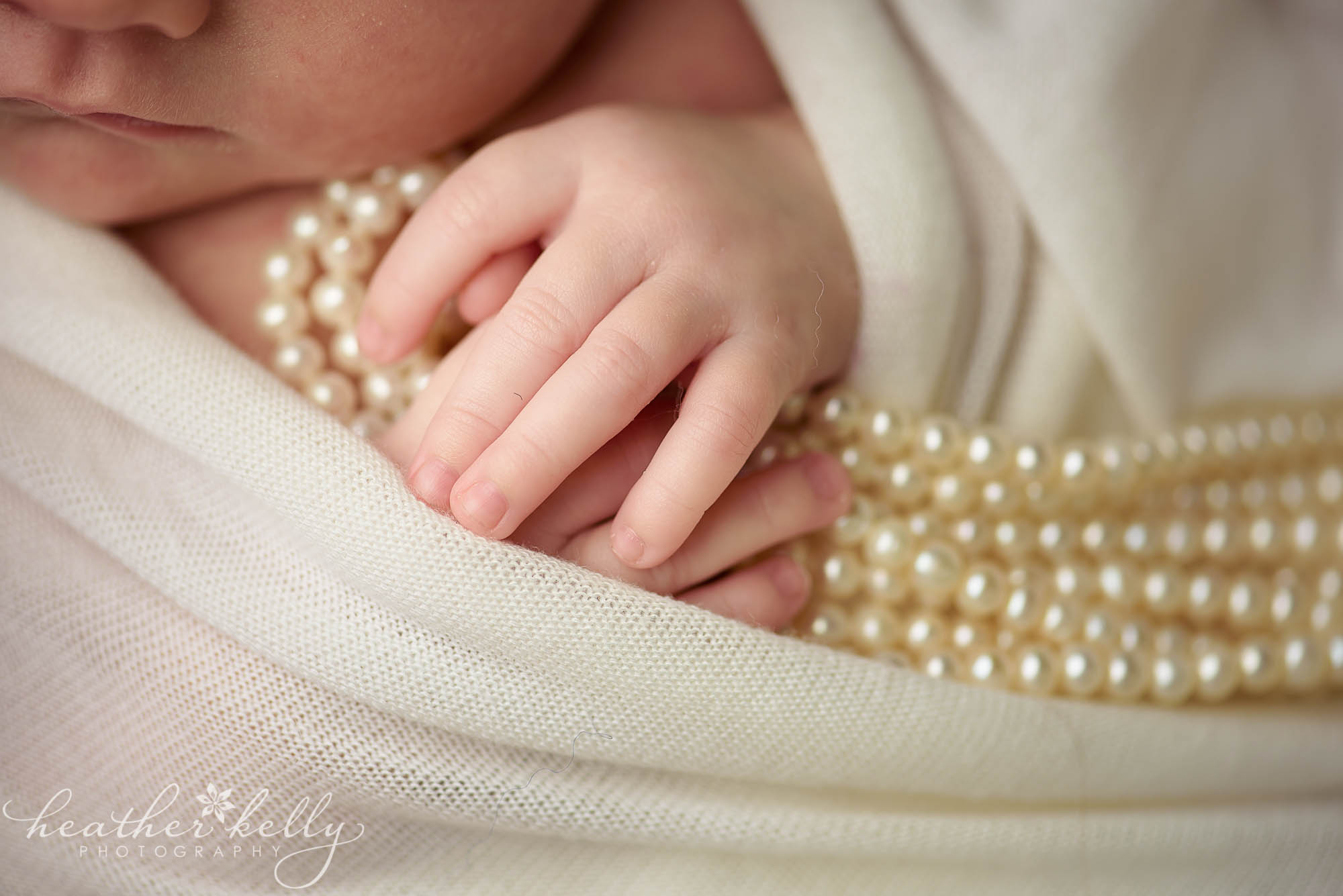newborn holding pearls west hartford newborn ct photography