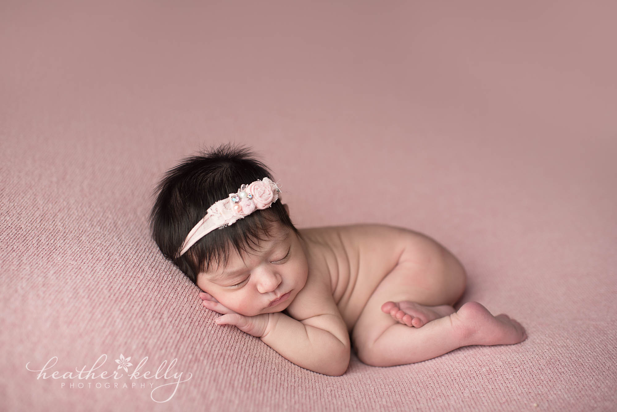 snuggled newborn photography on pink. milford ct