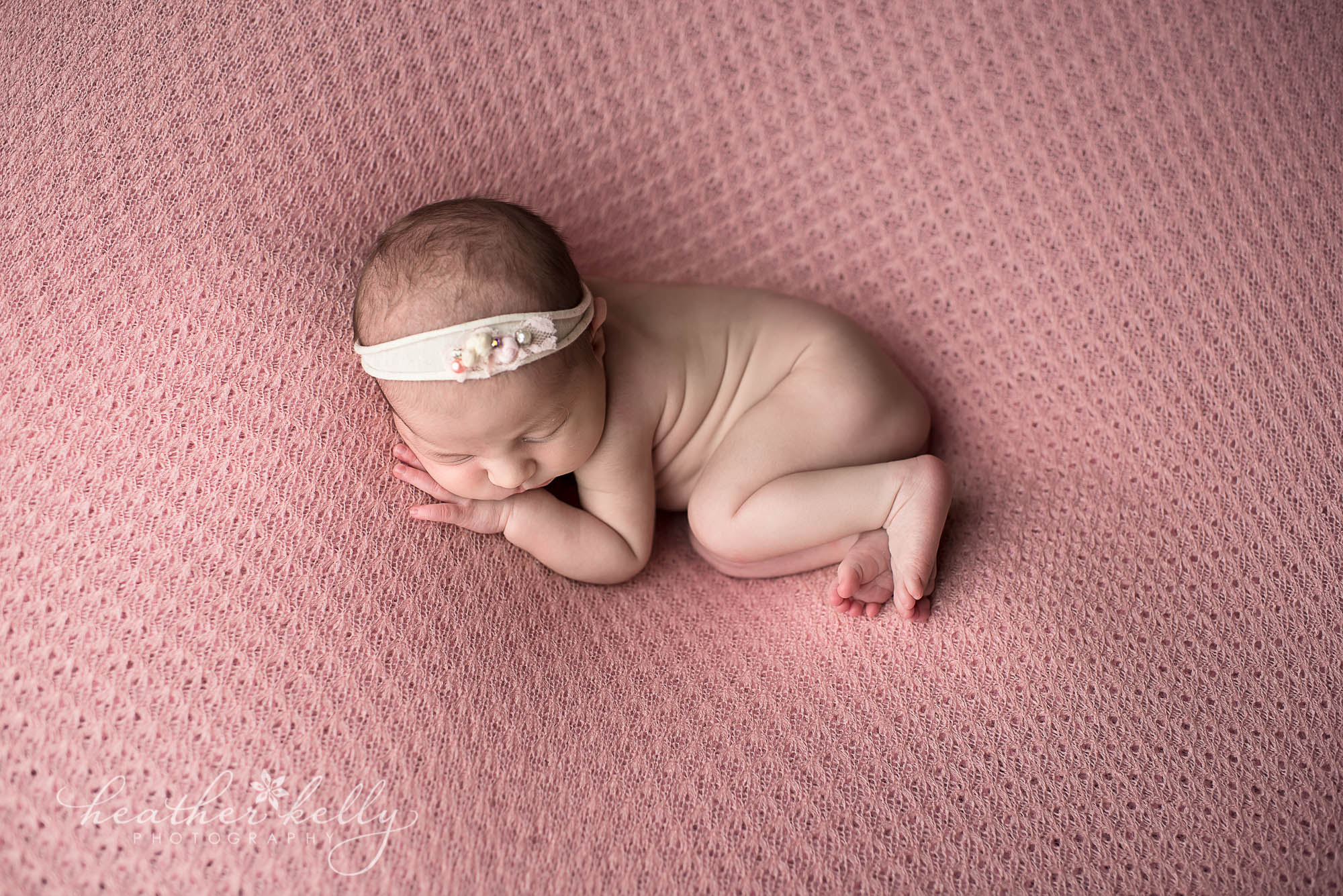 snuggled profile newborn girl. brookfield newborn photos