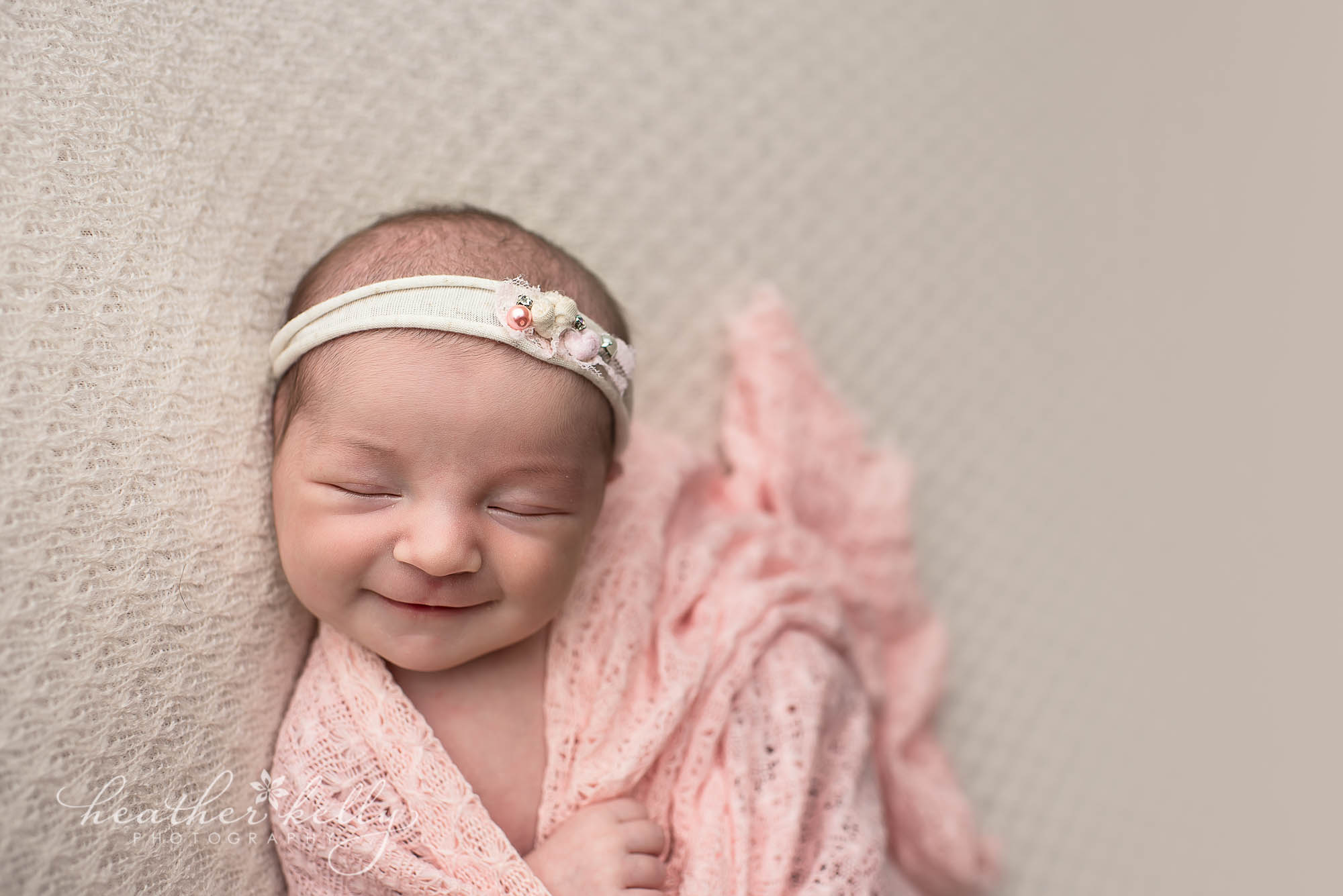 smiling newborn. brookfield newborn photos ct