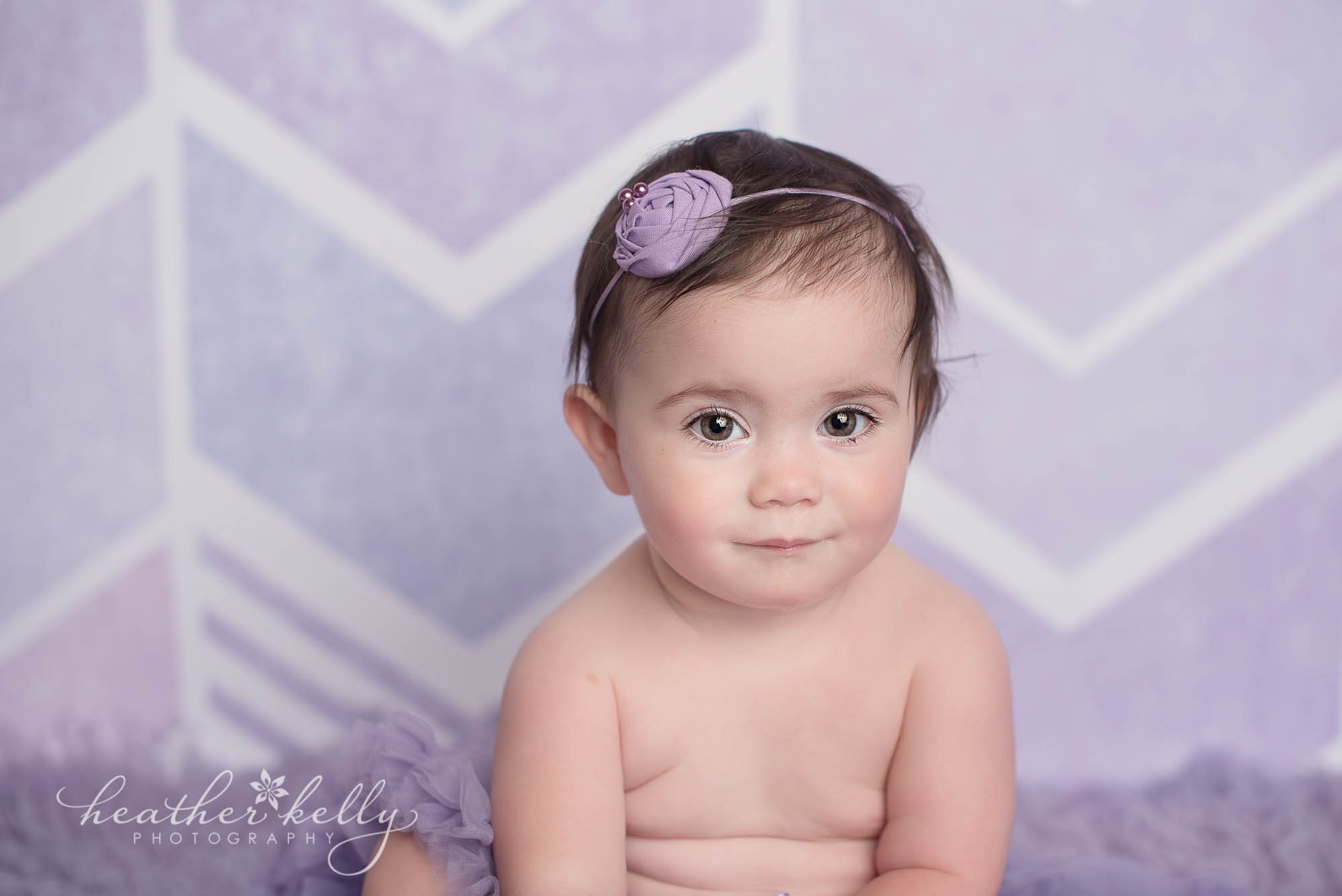 weston ct baby portrait. one year old girl purple