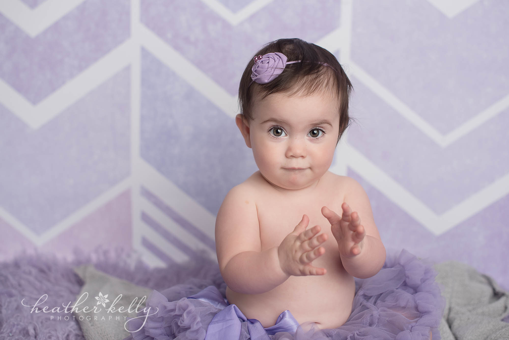 photo of one year old girl purple. weston ct baby photography