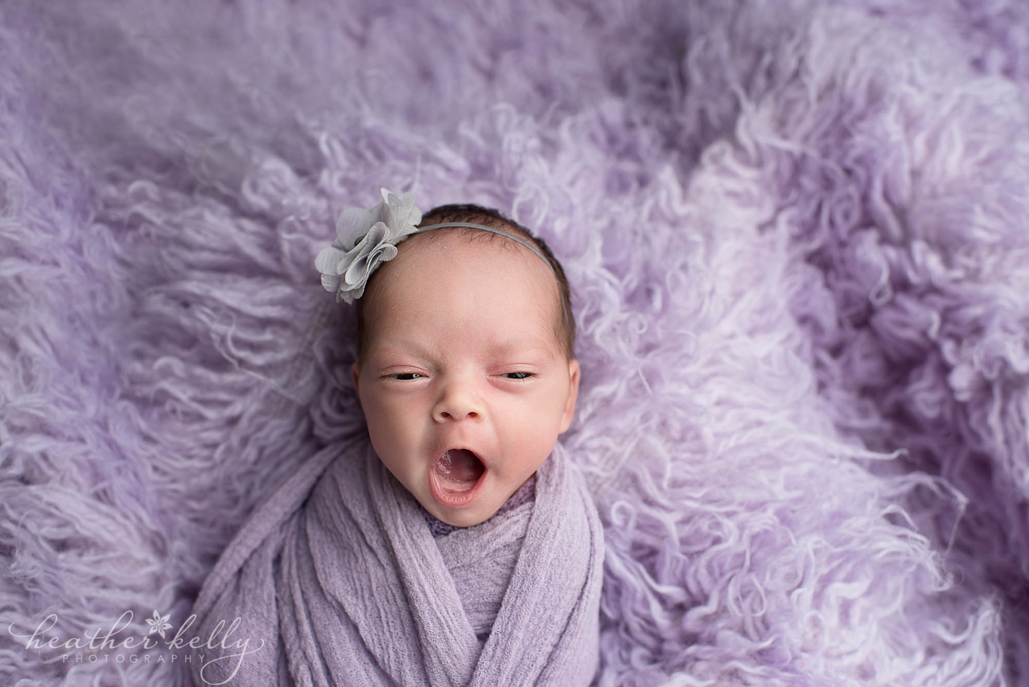 baby girl yawning. danbury newborn studio