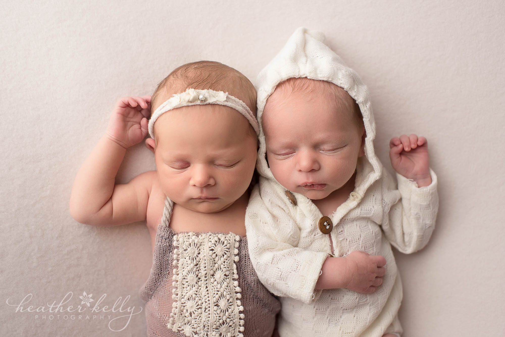 relaxing newborn twin pose