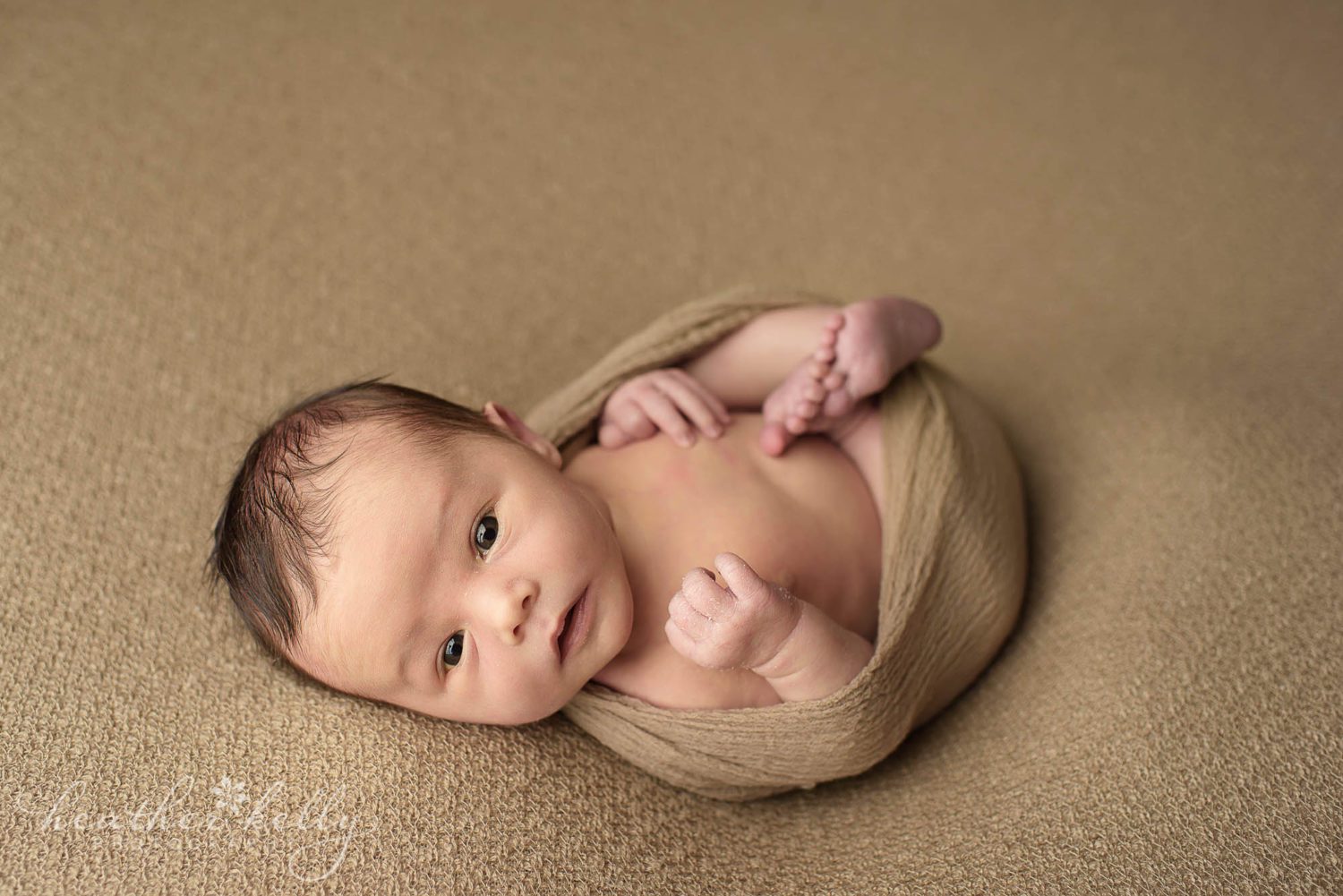wrapped awake newborn boy. newborn photography ct