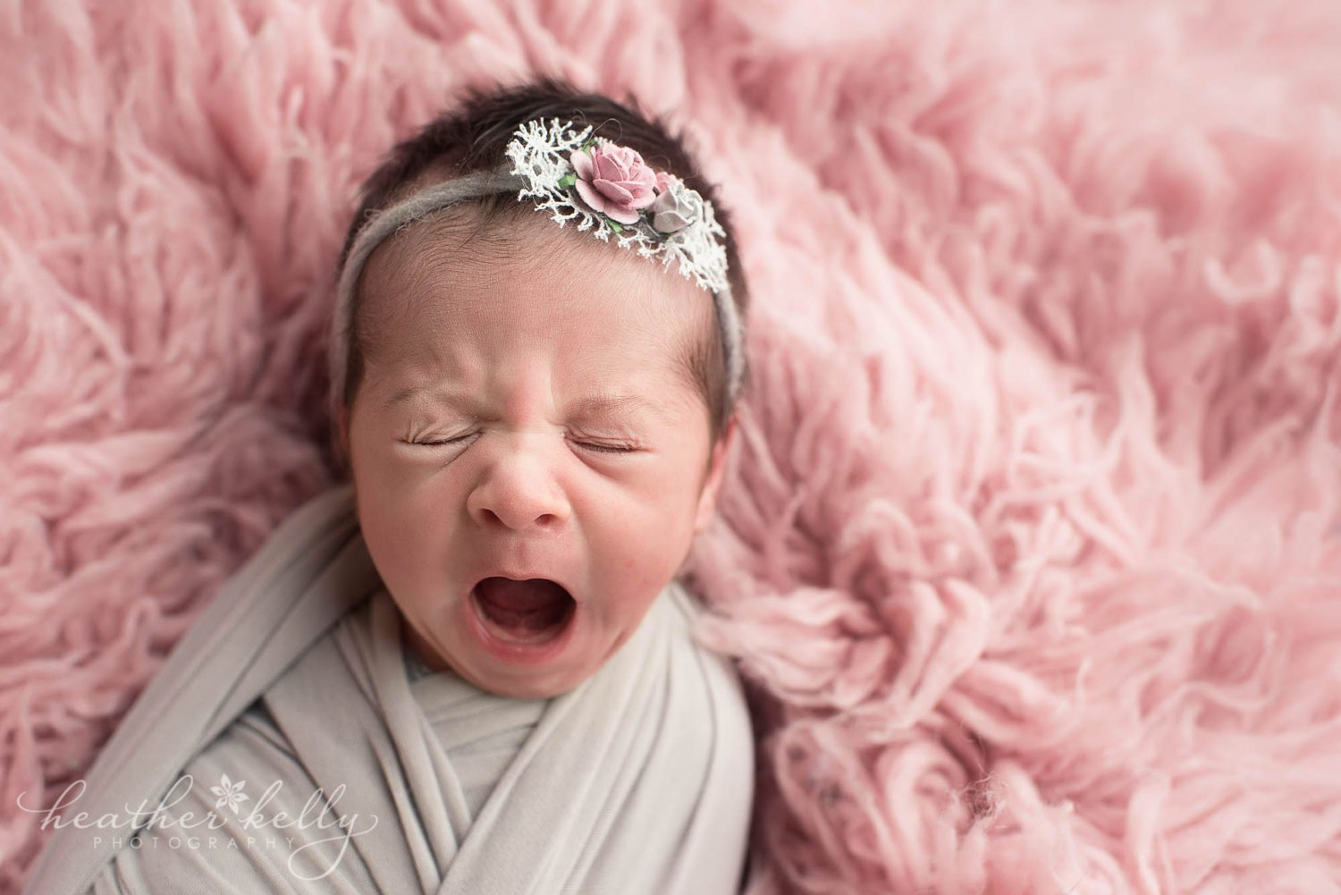 yawning newborn girl. newborn photography ct