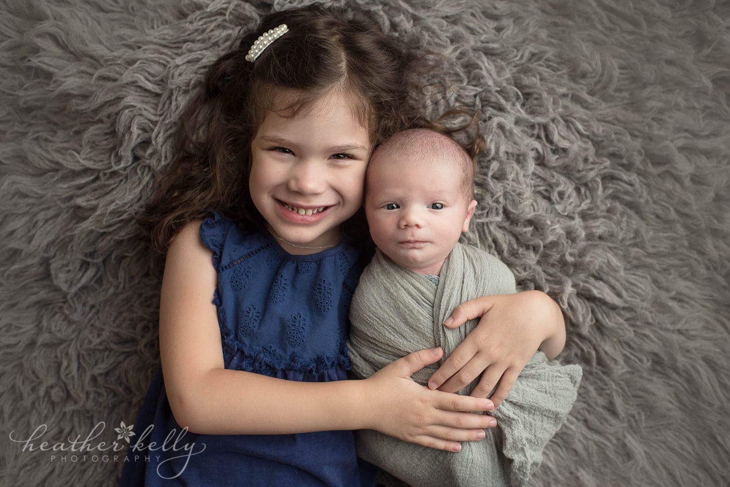 big sister and newborn boy photograph in fairfield ct