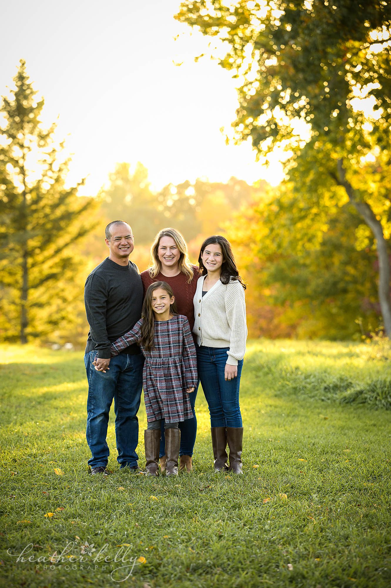 a family of 4 pose during a trumbull ct photo session